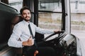 Smiling Man Driving Tour Bus. Professional Driver Royalty Free Stock Photo