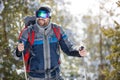 Man with equipment hiking in nature