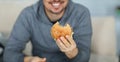 Smiling man and fastfood