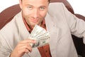Smiling man with few houndred dollars bills in the hand - isolated Royalty Free Stock Photo