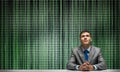 Smiling man folded hands and looking upward. Royalty Free Stock Photo