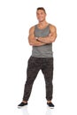 Smiling Man In Gray Tank Top Full Length Isolated