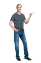 Smiling man in grey t-shirt and jeanse isolated on white background Royalty Free Stock Photo