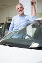 Smiling man holding car key Royalty Free Stock Photo