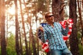 Smiling man holding USA flag. Celebrating Independence Day of America. July 4th. Man having fun Royalty Free Stock Photo