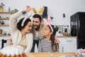 Smiling man hugging daughter and wife Royalty Free Stock Photo