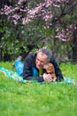 Smiling man hugs his funny dog Royalty Free Stock Photo