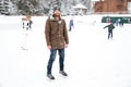 Smiling man ice skating outdoors Royalty Free Stock Photo