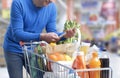 Man checking the grocery receipt Royalty Free Stock Photo