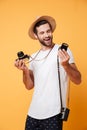 Smiling man looking at lens for his camera Royalty Free Stock Photo