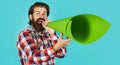 Smiling man with paper loudspeaker. Bearded male with megaphone. Advertising concept. Season sale.