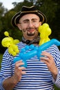 Smiling man in pirate suit with three air-ballons