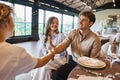 smiling man shaking hands with event Royalty Free Stock Photo