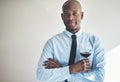 Confident mature man drinking a glass of red wine Royalty Free Stock Photo