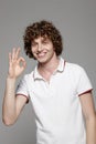 Smiling man showin OK sign Royalty Free Stock Photo