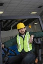 Smiling Man Sitting In Forklift Truck Royalty Free Stock Photo