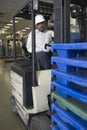 Smiling Man Sitting In Forklift Truck Royalty Free Stock Photo