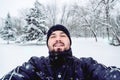 Smiling Man Taking Selfie In Snow Storm Royalty Free Stock Photo