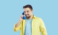 Smiling man talk on landline telephone Royalty Free Stock Photo