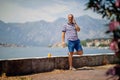 Smiling man talking on his mobile phone atvacation journey Royalty Free Stock Photo