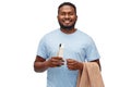 Smiling man with toothbrush, toothpaste and towel Royalty Free Stock Photo