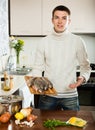 Smiling man with trout fish Royalty Free Stock Photo