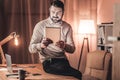 Smiling man watching a video on a tablet Royalty Free Stock Photo