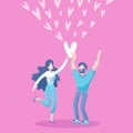 Smiling man and woman looking at each other with love and holding heart in hands and around. Trendy flat cartoon Royalty Free Stock Photo