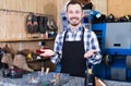 Smiling man worker displaying his workplace Royalty Free Stock Photo