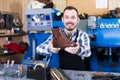 Smiling man worker displaying result of his work Royalty Free Stock Photo