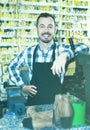 Smiling man worker preparing his tools for repairing Royalty Free Stock Photo