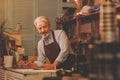 Smiling man in a workshop Royalty Free Stock Photo