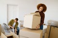 Happy couple packing beginnings before home moving Royalty Free Stock Photo
