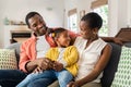 Cheerful african american family having fun at home Royalty Free Stock Photo