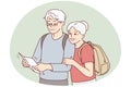 Smiling mature couple look at map traveling