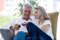 Smiling mature couple toasting red wine at home Royalty Free Stock Photo