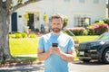 smiling mature man dealer chatting online renting car, dealership Royalty Free Stock Photo