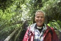 Smiling Mature Man In Forest