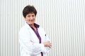 Smiling mature professional woman in labcoat Royalty Free Stock Photo