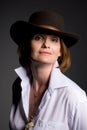 Smiling mature woman a cowboy hat Royalty Free Stock Photo