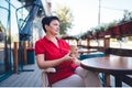 Smiling mature woman drinking coffee