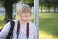 Smiling mature woman outdoors with copy space Royalty Free Stock Photo