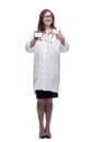 Smiling medical doctor woman showing her visiting card Royalty Free Stock Photo