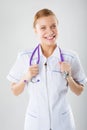 Smiling medical doctor woman with stethoscope. Isolated over white background Royalty Free Stock Photo