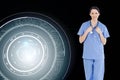 Smiling medical intern wearing a blue shortsleeve uniform