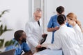 Smiling medics enjoying conversation at the reception area of the clinic Royalty Free Stock Photo