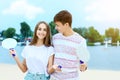 Young couple in love playing with matkot rackets