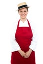Smiling middle aged female chef wearing hat Royalty Free Stock Photo