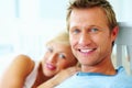 Smiling middle aged man with a blur woman. Closeup portrait of a smiling middle aged man with a blur woman. Royalty Free Stock Photo