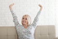 Embracing the joys of middle age with a smile. Smiling middle aged mature woman with a stylish haircut, happy old lady Royalty Free Stock Photo